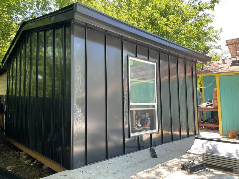 Black standing seam metal wall panels for Roof Inspection in Gibsonton