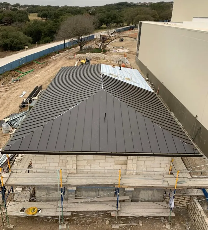 Metal roof new construction with scaffolding in Gibsonton